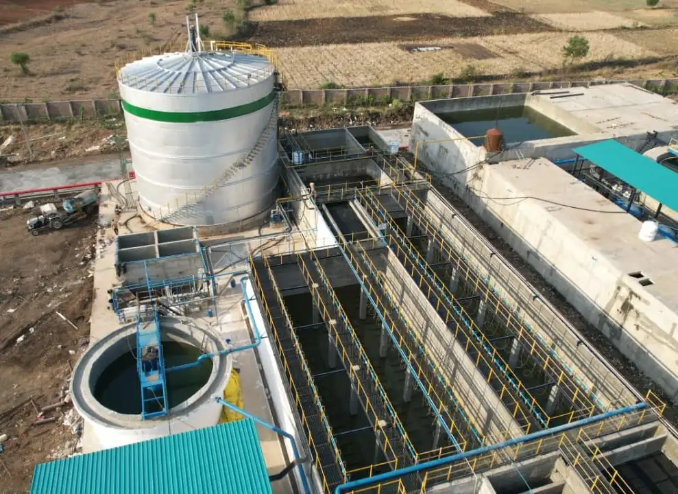 Aerial view of a treatment plant built by SBS Water with storage tank, clarifier and process basins