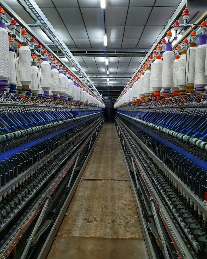 Spinning machines in a textile mill
