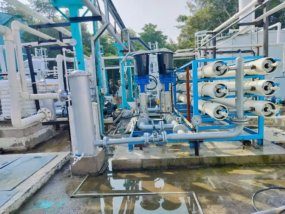 RO skid with membrane housings next to water treatment filters
