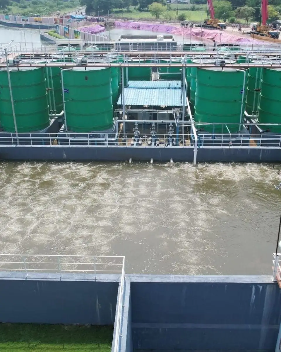 Aerated biological tank of an SBS sewage treatment plant beside green process tanks