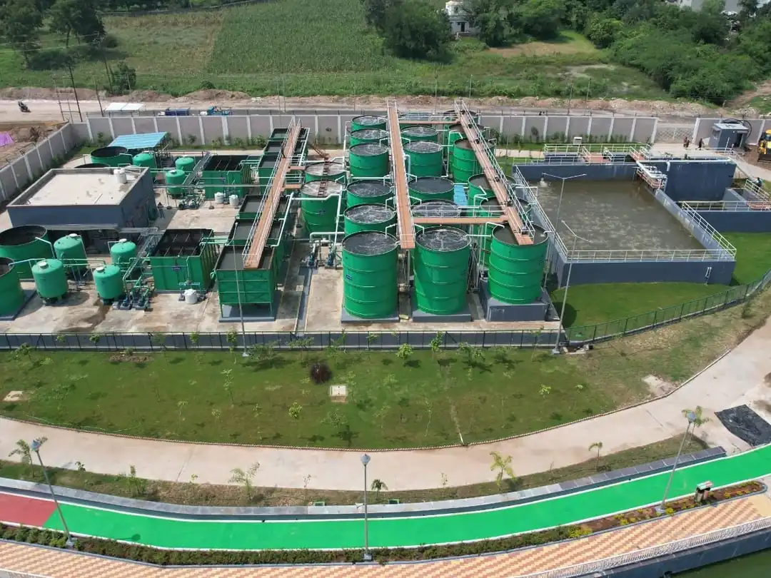 Newly commissioned sewage treatment plant by SBS Water inside a landscaped campus