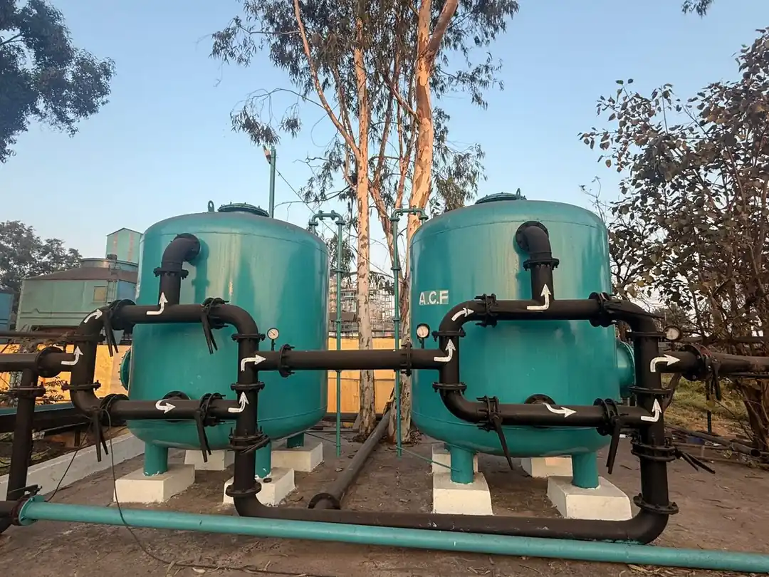 Twin multigrade and activated carbon filters of a water treatment plant built by SBS Water