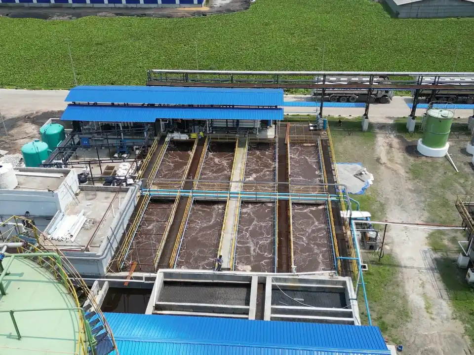 Aerial view of the Kamakhya Biofuels plant, with treatment basins, filter units and the pump house