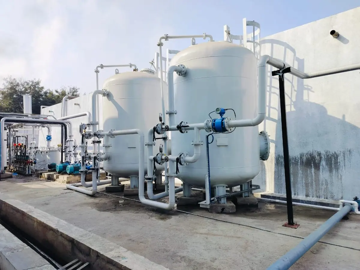 Pressure filters and pumps of the water treatment plant at Ambalika Sugars, Karjat