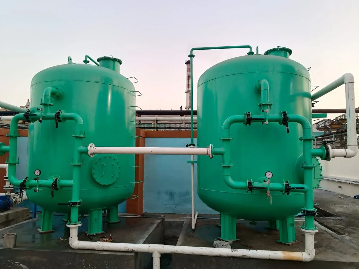 Twin multigrade and activated carbon filters