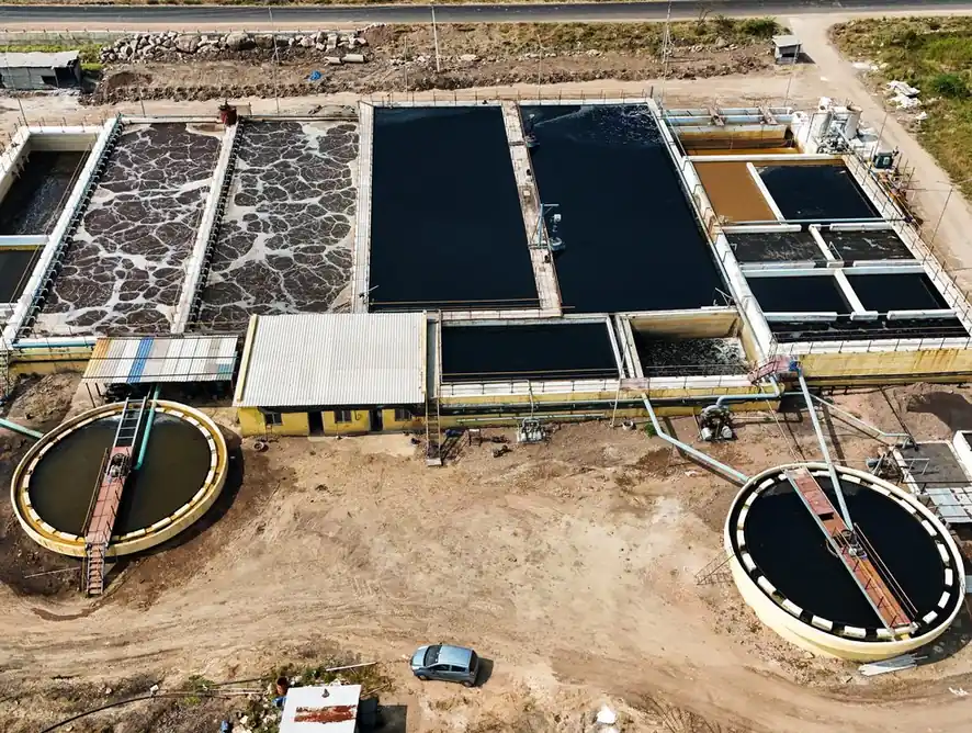 Aerial view of an SBS Water treatment plant with clarifiers and aeration tanks